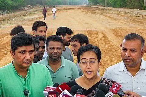 Saurabh Bharadwaj with Atishi speak to the media